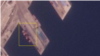 라진항을 촬영한 7일 자 위성사진에 100m 길이의 선박과 바로 앞에 놓인 컨테이너(사각형 안)가 보인다. 사진=Planet Labs