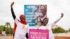 Gambian activists Rohey Cham and Sainabou Sey celebrate after the country's parliament rejected the bill to end a ban on female genital mutilation (FGM) in Banjul, Gambia, July 15, 2024.