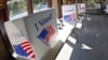 FILE - A ballot completion area in McCandless, Pa., Oct. 9, 2020. A U.S. judge on Tuesday dismissed a lawsuit seeking to force election battleground state Pennsylvania to strengthen its procedures for verifying ballots submitted by military and overseas voters. 