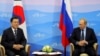 Russian President Vladimir Putin and his South Korean counterpart Moon Jae-in attend a meeting during the Eastern Economic Forum in Vladivostok, Russia, Sept. 6, 2017. 