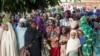 FILE - Refugees from Central Africa wait in Cameroonian Garoua Boulaï border town for foods and clothes delivering by humanitarian associations, April 25, 2014. 