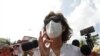 FILE - Cristiana Chamorro, one of Nicaragua’s main presumptive presidential candidates, talks to reporters in Managua, Nicaragua, May 21, 2021. .