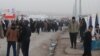 Displaced families living in camps in the deserts around Mosul have little access to the outside world, but many families say they are at least safe as they face an uncertain future, Khazir, Kurdish Iraq, Jan. 10, 2017. (H. Murdock/VOA)