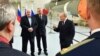 Russian President Vladimir Putin, right, Belarusian President Alexander Lukashenko, left, and Russian Roscosmos head Dmitry Rogozin visit the Vostochny cosmodrome outside the city of Tsiolkovsky, about 200 kilometers (125 miles) from the city of Blagovesh