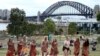 FILE - Traditional Aboriginal dancers perform on Australia Day in Sydney, Australia.