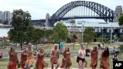 FILE - Traditional Aboriginal dancers perform on Australia Day in Sydney, Australia.