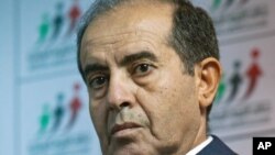 Mahmoud Jibril speaks to the media during a press conference at National Forces Allies head quarter in Tripoli, Libya, July 8, 2012.