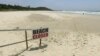 This Nov. 7, 2018, image made from video shows the beach where a shark attack occurred in Ballina, Australia. 