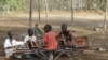 Sudanese children play with a broken playground chair in Kakuma Refugee camp, which houses over 60,000 refugees in North western Kenya. (File Photo)