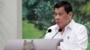 Philippines President Rodrigo Duterte delivers a speech at the start of a state dinner hosted by Singapore's President Tony Tan at the Istana in Singapore, Dec. 15, 2016.