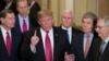 FILE - In this Jan. 9, 2019 photo, Republican senators stand with President Donald Trump, Vice President Pence, and Senator Mitch McConnell, at the Capitol, in Washington.