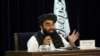 FILE - Taliban spokesman Zabihullah Mujahid speaks during a press conference in Kabul, Afghanistan, Sept. 7, 2021.