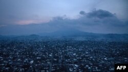 FILE - A view of the city of Goma in front of the Nyiragongo volcano, north of Goma, the provincial capital of North Kivu, May 30, 2021. 