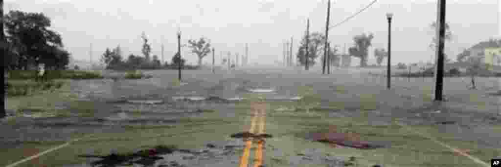On Hurricane Katrina's seventh aniversary, Huricane Isaac floods parts of Waveland, Miss., Aug. 29, 2012.