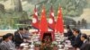 中国国家主席习近平于2016年3月21日在北京人民大会堂和尼泊尔总理卡德加·普拉萨德·夏尔马·奥利（左起第二人）会谈。