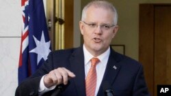 Australian Prime Minister Scott Morrison addresses media at Parliament House in Canberra, Australia, Feb. 13, 2019. 