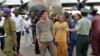 Chinese and Cameroonian hostages, who were released to the Cameroonian authorities after being kidnapped in raids blamed on the Nigerian Islamist group Boko Haram, arrive in Yaounde, Oct. 11, 2014. 
