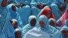 Women attend a ceremony marking Somalia's independence day in Mogadishu, July 1, 2012. 