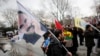 Demonstrators wave flags with the image of imprisoned Kurdish rebel leader Abdullah Ocalan during a rally in Istanbul, Feb. 15, 2015. 