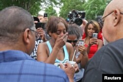 FILE - Diamond Reynolds weeps after she recounts the incidents that led to the fatal shooting of her boyfriend Philando Castile by Minneapolis area police during a traffic stop.