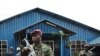 Kenyan police officers secure the site of a grenade attack in Nairobi on April 29, 2012 (file photo).