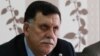 Libya's Prime Minister-designate Fayez al-Sarraj chairs a Presidential Council of the Government of National Reconciliation meeting with local mayors inside the naval base in the Libyan capital, Tripoli, April 3, 2016. 