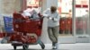 Betsy McGonagle checks her receipt after shopping for Black Friday discounts at a Target store, Philadelphia, Pennsylvania, November 23, 2012.
