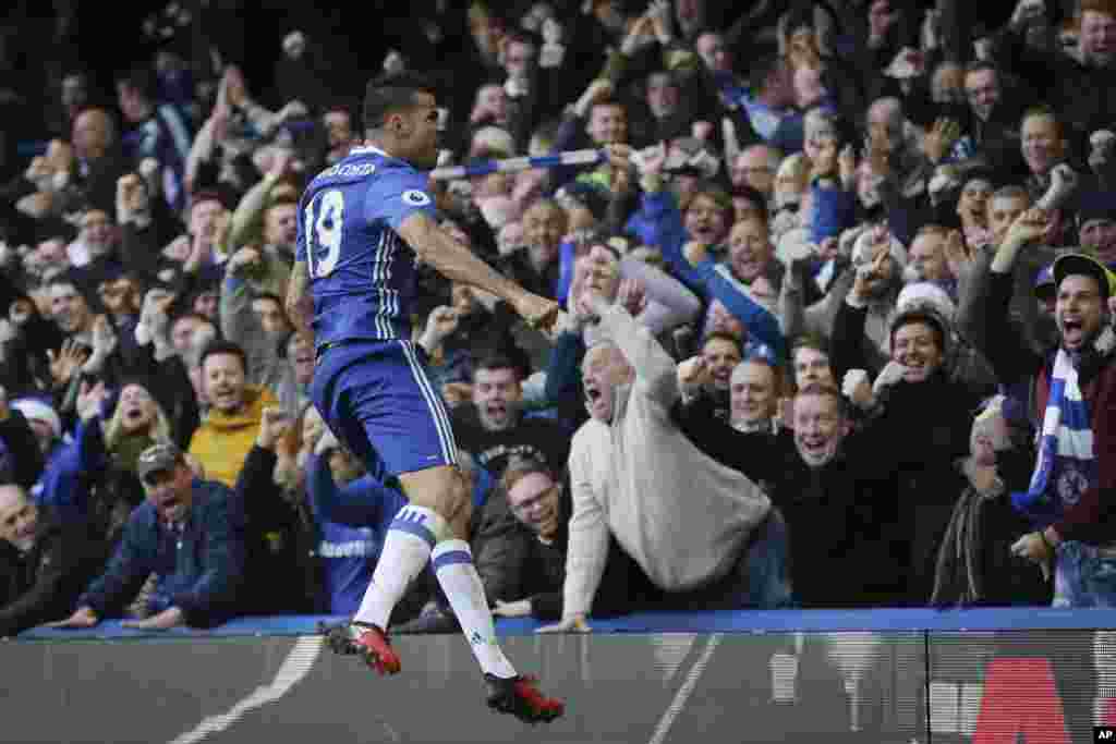 Chelsea's Diego Costa celebrates after scoring a goal during the English Premier League soccer match between Chelsea and West Bromwich Albion at Stamford Bridge in London.
