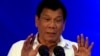 FILE - Philippine President Rodrigo Duterte delivers a speech during the 80th National Bureau of Investigation anniversary, Nov. 14, 2016. On Thursday Duterte said he might withdraw from the International Criminal Court. 