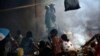 Muslim refugees prepare food at the Catholic church in Carnot, Central African Republic, April 15, 2014.