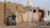 Girls play at a makeshift camp for internally displaced people (IDPs) in the oil-producing Marib province, Yemen May 10, 2021.