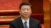  In this March 12, 2019, file photo, Chinese President Xi Jinping attends a plenary session of China's National People's Congress (NPC) at the Great Hall of the People in Beijing.