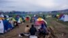 Sunset approaches on the Greek-Macedonian border Friday and refugees -- mostly Syrian and Iraqis -- prepare for another night waiting to see if the border will be reopened. (J. Dettmer/VOA)