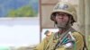 FILE - Cameroonian soldier stands guard.