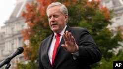 FILE - Then-White House chief of staff Mark Meadows speaks with reporters at the White House, Oct. 21, 2020, in Washington. 