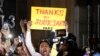 Indians hold banners and shout slogans outside Tihar central prison in New Delhi, March 20, 2020. Four men who were sentenced to capital punishment for the 2012 gang rape of a 23 year-old student on a moving bus in New Delhi have been executed.