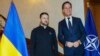 NATO Secretary General Mark Rutte, right, greets Ukraine's President Volodymyr Zelenskyy prior to a meeting in Brussels, Dec. 18, 2024. 