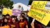Immigration activists with Coalition for Humane Immigrant Rights of Los Angeles (CHIRLA) demand the Mexican government take more measures to protect and respect the rights of unaccompanied minors and families crossing Mexico's territory, during a protest 