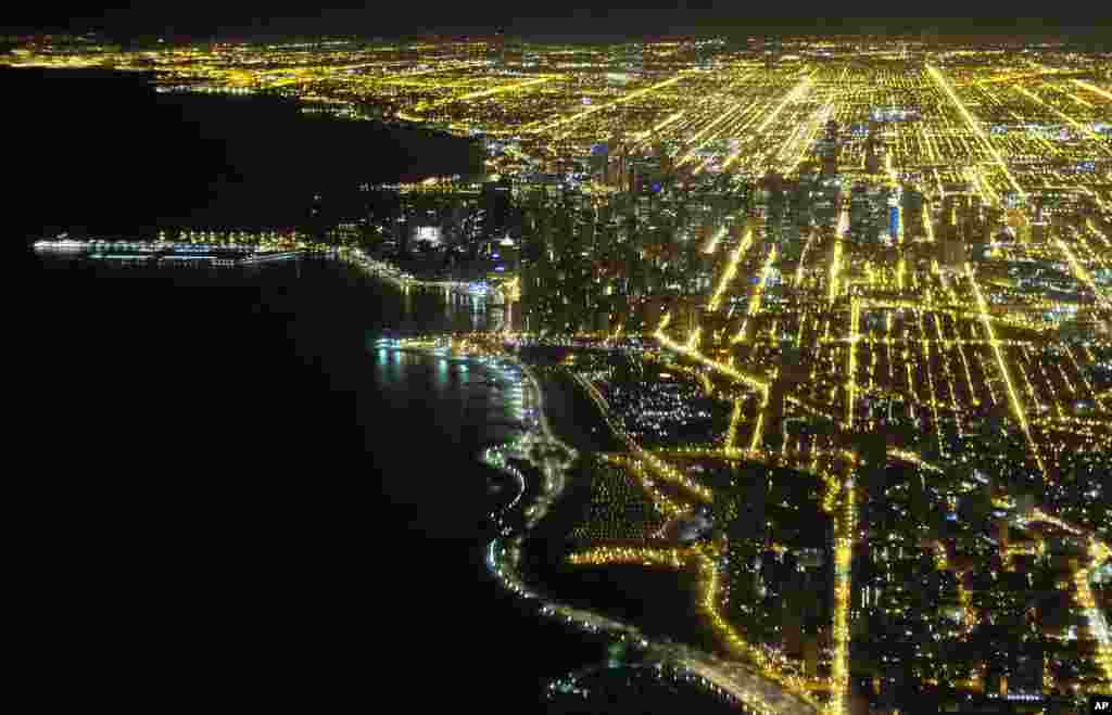 Lights illuminate the downtown Chicago skyline, Illinois, Dec. 7, 2016.