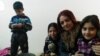 Ali's mother, Iman, and her four children were imprisoned as human shields by IS militants as Iraqi forces attacked, recapturing their area early this year in Mosul, Iraq, on Jan. 27, 2017. (H.Murdock/VOA)
