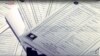 Documents identifying supporters of Islamic State are seen in this still image from video, released by Sky News to Reuters in London, March 10, 2016.