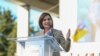 FILE - Moldovan President and candidate to re-election Maia Sandu delivers a speech during a rally to launch her electoral campaign in Chisinau, on Sept. 20, 2024. 