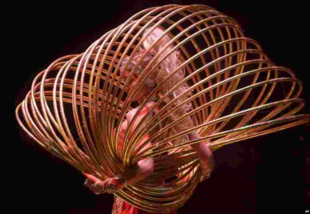 A circus artist performs during a rehearsal of the Giant Fountains show in the Belarusian State Circus in Minsk, Belarus.