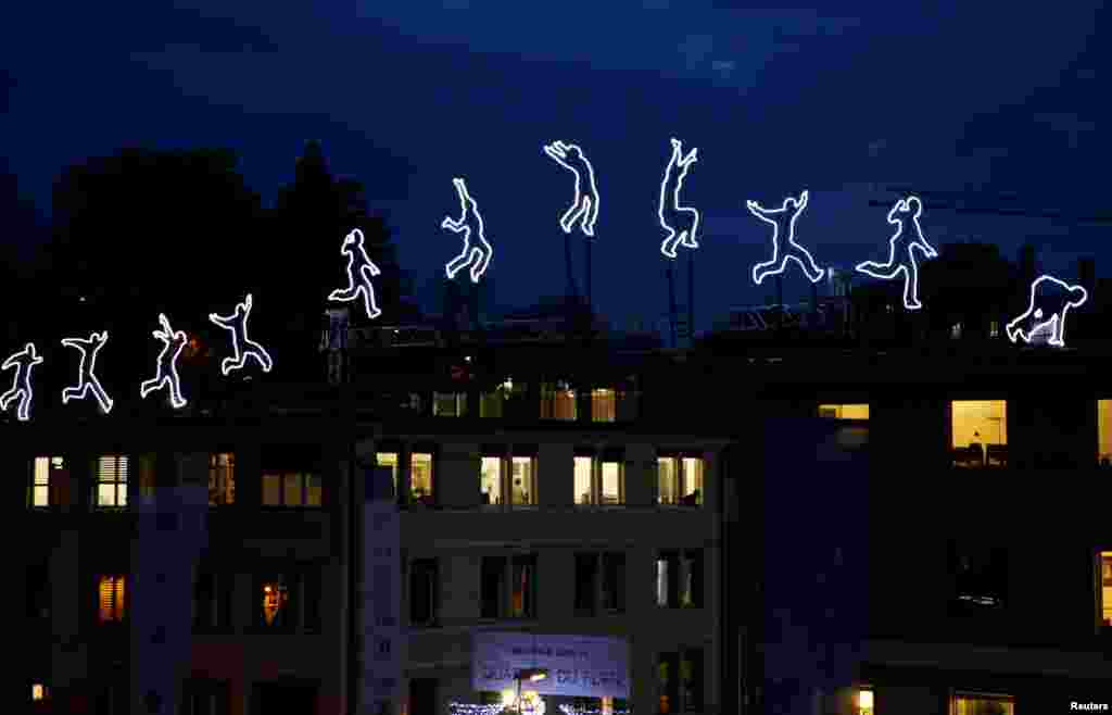 The light installation "Run Beyond" by Angelo Bonello is pictured ahead of the opening of the Lausanne Lumieres light festival in Lausanne, Switzerland.