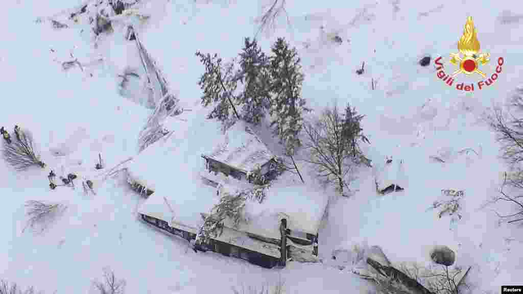 An aerial view shows Hotel Rigopiano in Farindola, central Italy, hit by an avalanche, in this handout picture provided by Italy&#39;s firefighters.