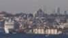 FILE - Minarets of the Ottoman-era Suleymaniye mosque punctuate Istanbul’s skyline. Turkey is building mosques abroad as President Tayyip Erdogan seeks to expand influence in the Muslim world.