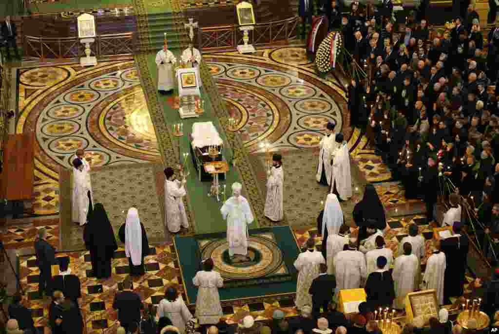 Russian Orthodox Church Patriarch Krill, on podium, conducts a religious service for killed Russian ambassador to Turkey, Andrei Karlov inside the Christ the Saviour Cathedral in Moscow. Karlov was fatally shot by a Turkish policeman in a gathering in Ankara.