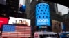 FILE - Nasdaq is ready for the Zoom IPO, in New York, April 18, 2019. The videoconferencing company is headquartered in San Jose, California. 