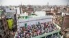 Muslim devotees offer Friday prayers at a mosque following sectarian riots over India's new citizenship law, at Mustafabad area in New Delhi. 