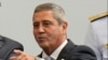 FILE - Brazilian Defense Minister Walter Souza Braga Netto attends a ceremony honoring military athletes who participated in the Tokyo 2020 Olympic Games in Rio de Janeiro, Sept. 1, 2021. 